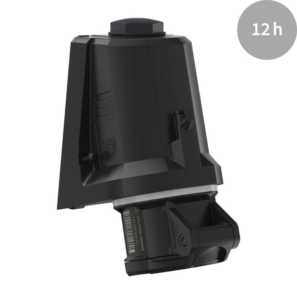 Ein schwarzes elektronisches Gerät mit einer sechseckigen Kappe, das einem Batterie- oder Motorbestandteil ähnelt, wird vor einem einfarbigen Hintergrund präsentiert, mit einer '12h' in einem grauen Kreis.