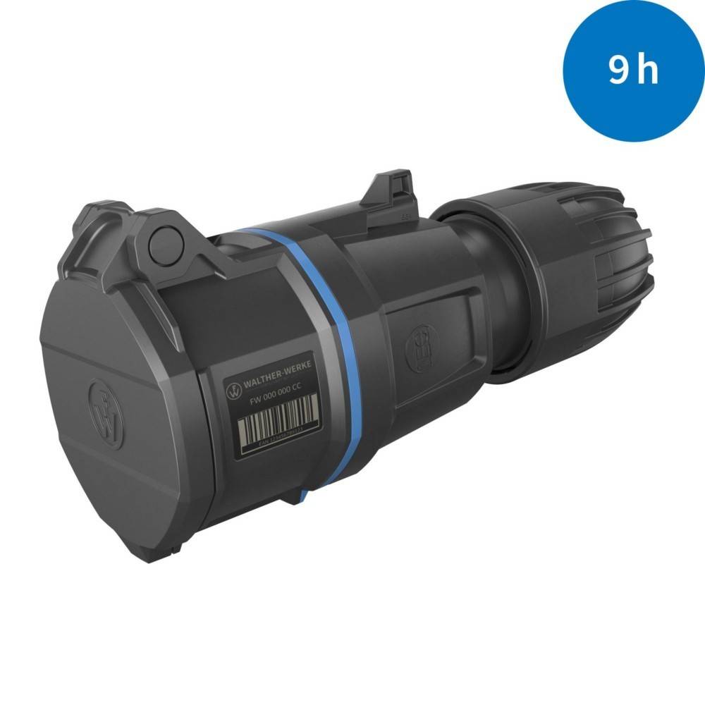 Ein schwarzer zylindrischer Anschluss mit der Beschriftung 