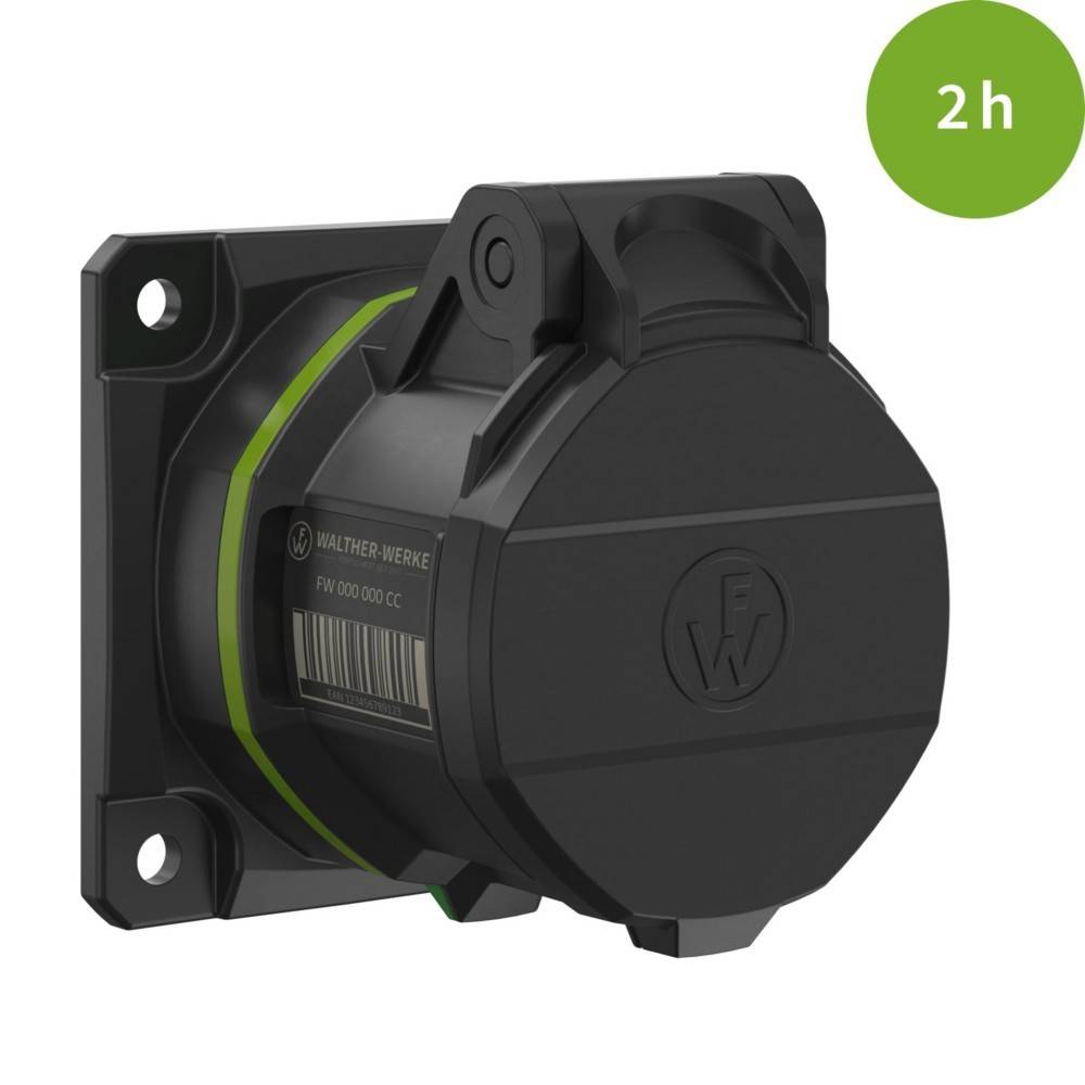 Eine schwarze elektrische Wandsteckdose mit geschlossenem Schutzdeckel, für den Außeneinsatz konzipiert. Eine grüne Beschriftung zeigt eine Dauer von '2h' an.