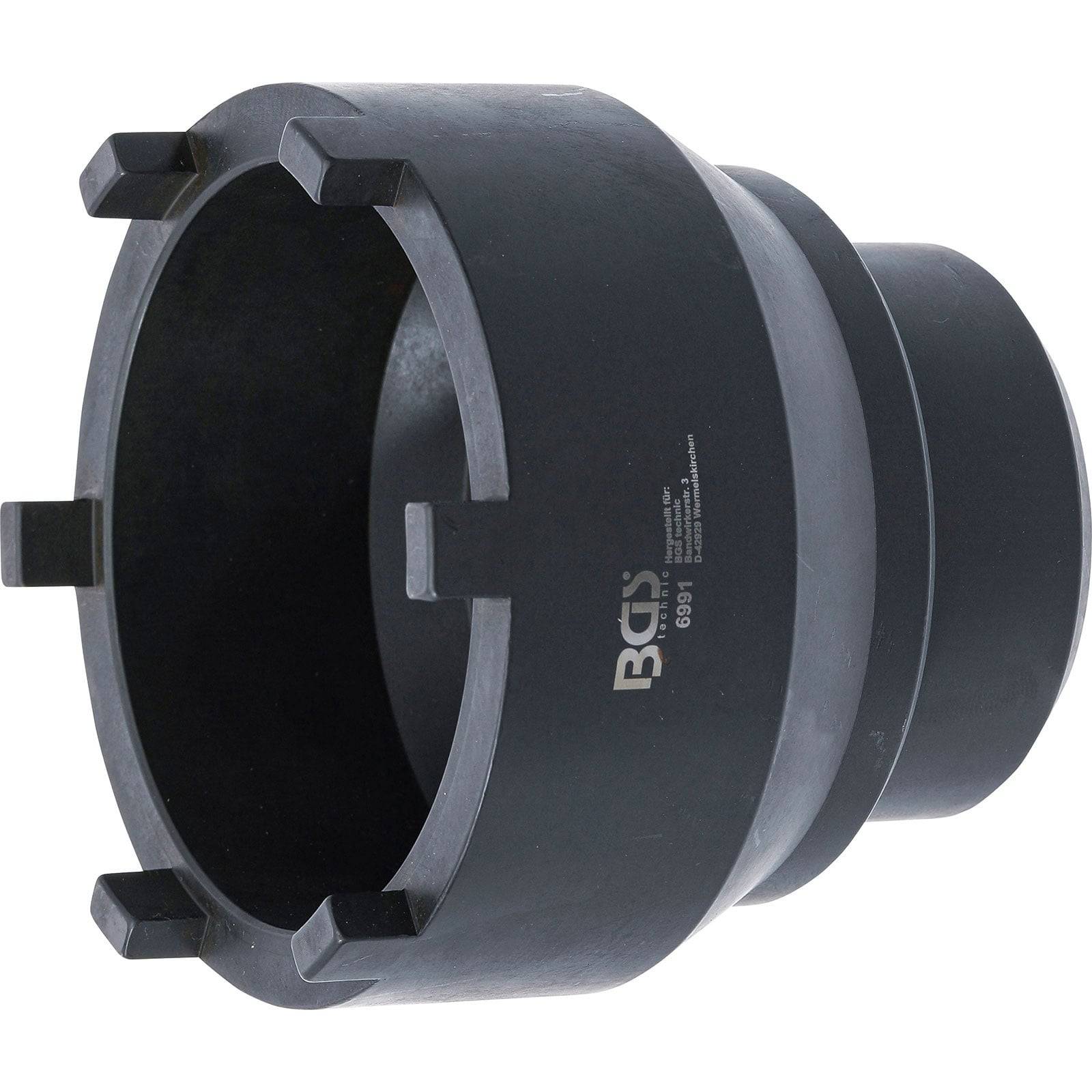 Ein schwarzer zylindrischer Werkzeug mit vier hervorstehenden Laschen an der Kante, wahrscheinlich für automotive oder mechanische Anwendungen verwendet.