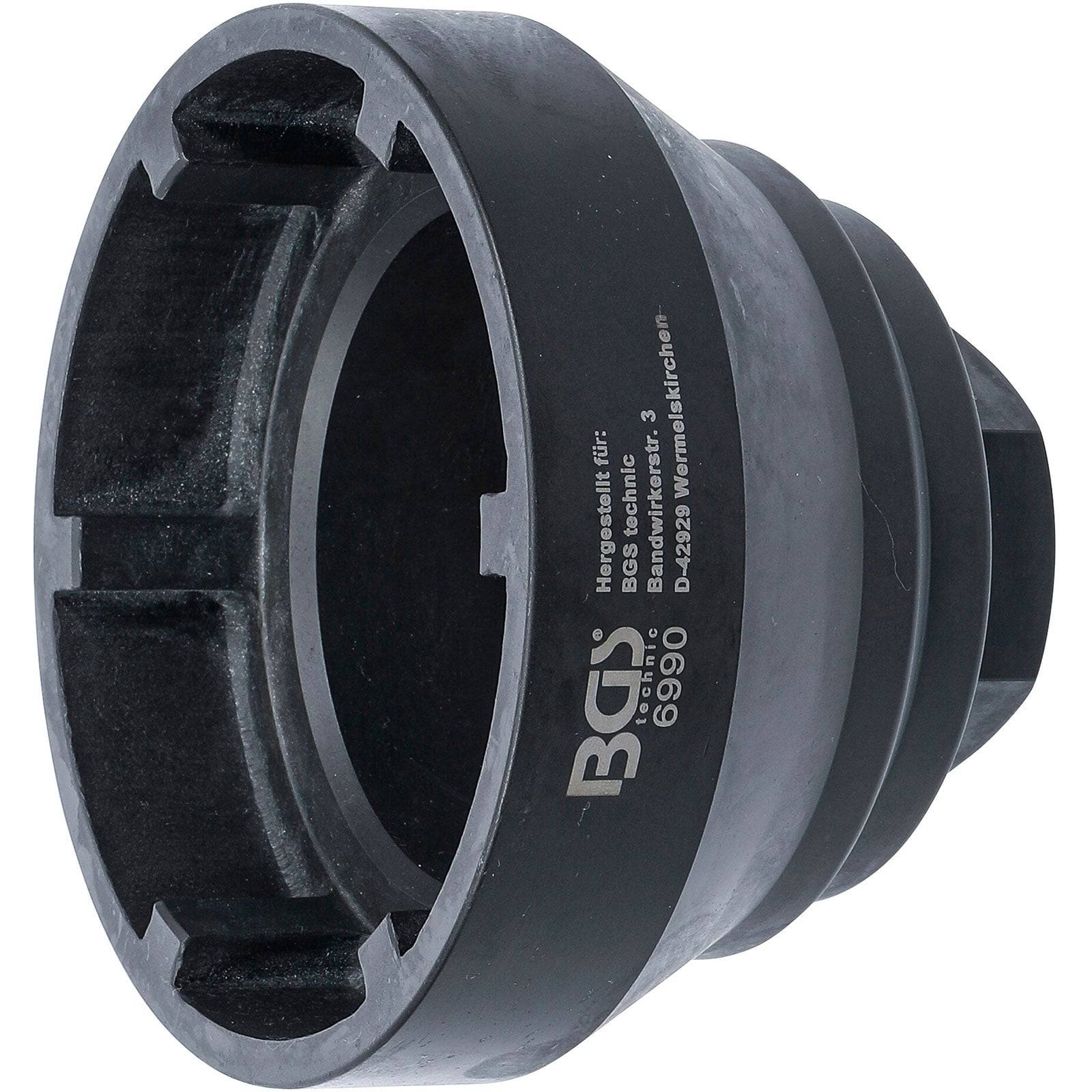 Ein schwarzes BGS-Automotive-Werkzeug, Modell 6990, verwendet zum Entfernen von Getriebeölwartungsdeckeln. Zylinderform mit gerillten Kanten und Aufschriften.