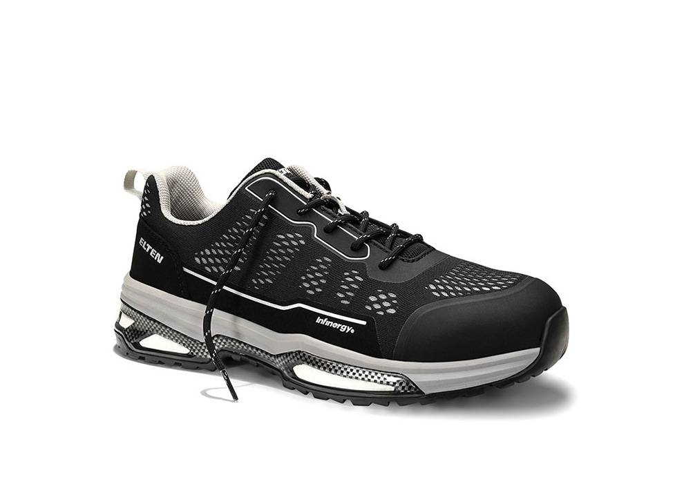 Ein schwarz-weißer athletischer Schuh mit Mesh-Design, robuster Sohle und Markenlogo 'Elten'. Geeignet für Sport oder Freizeitkleidung.