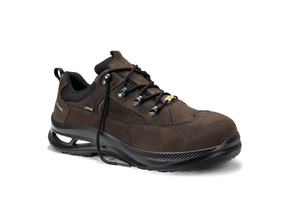 Brauner Wanderschuh mit schwarzer Sohle und Schnürsenkeln, geeignet für Outdoor-Aktivitäten. Merkmale umfassen robustes Material und gedämpfte Unterstützung.