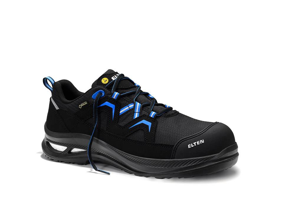 Ein schwarzer Sportschuh mit blauen Akzenten und 'Elten' Logo, ausgestattet mit robusten Schnürsenkeln und einer griffigen Gummisohle, die auf Komfort und Langlebigkeit ausgelegt ist.