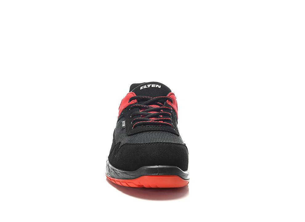 Ein schwarzer und roter Sportschuh, der nach vorne gerichtet ist, mit dem Markennamen 'Elten', der auf der Zunge sichtbar ist.