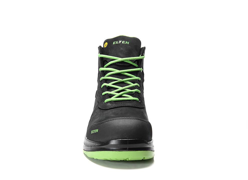 Ein einzelner schwarzer Stiefel mit hellgrünen Schnürsenkeln und Sohle, mit dem Markennamen 'ELTEN' in grünen Buchstaben auf der Zunge und der Seite.