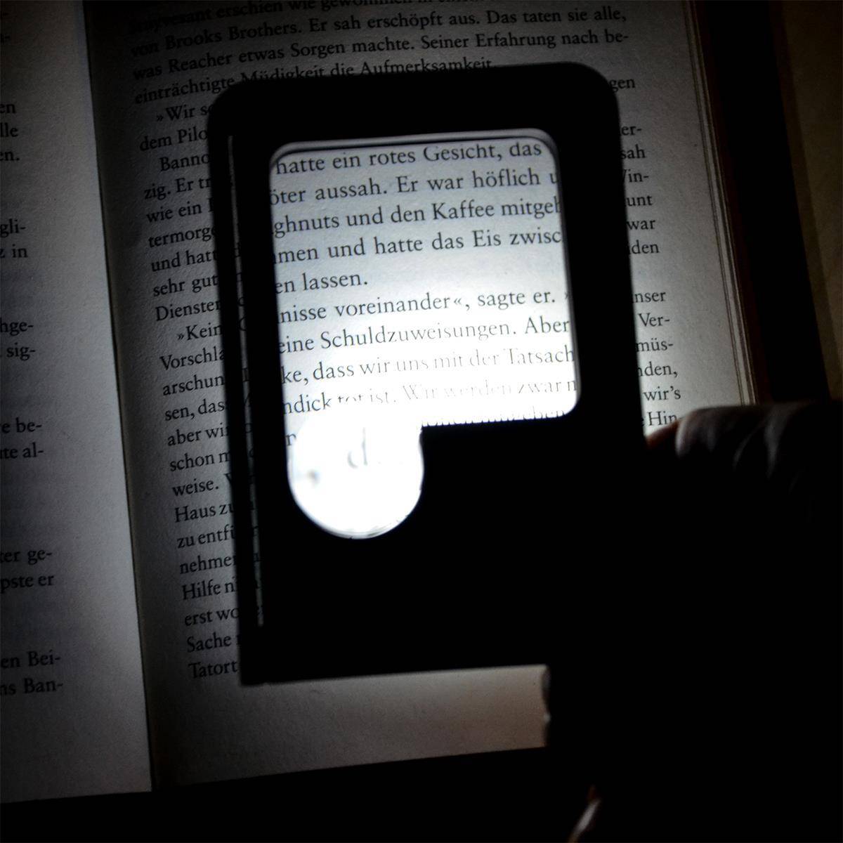 eyepower LED-Taschenlupe Klapplupe | 2 LED Kaltweiß 1 UV-LED | 2.5fache / 7fache Vergrößerung | Schwarz gummierte Oberfläche