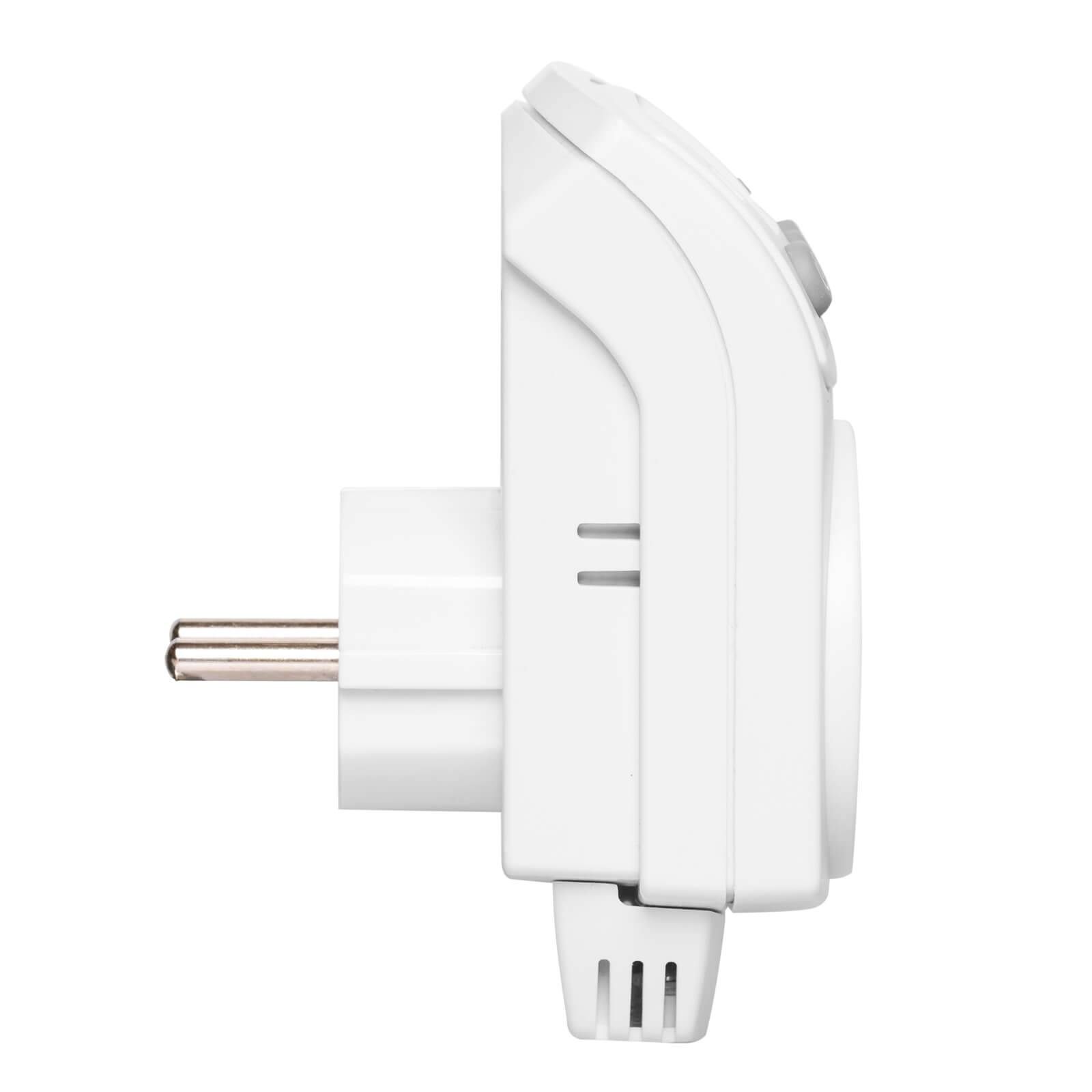 Seitenansicht eines weißen Stecker-Elektrogeräts mit zwei Metallkontakten, wahrscheinlich ein kompakter wandmontierter Sensor oder Timer.