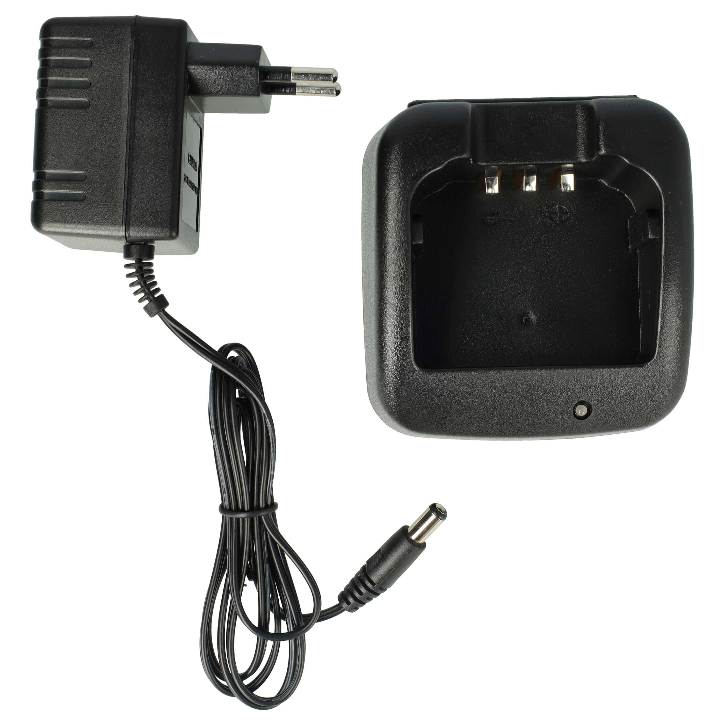 Ein schwarzes Batterieladegerät mit europäischem Stecker und aufgewickeltem Kabel, geeignet zum Laden von Geräten oder wiederaufladbaren Batterien.