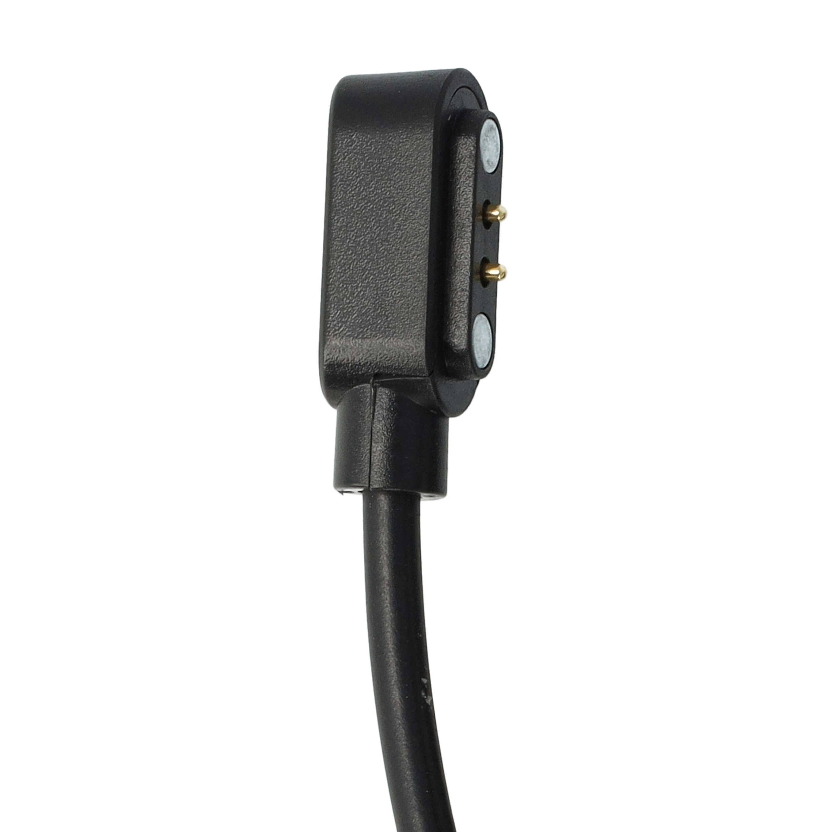 Nahaufnahme eines schwarzen magnetischen Ladeanschlusses mit zwei goldenen Kontaktstiften auf einem Kabel vor weißem Hintergrund.