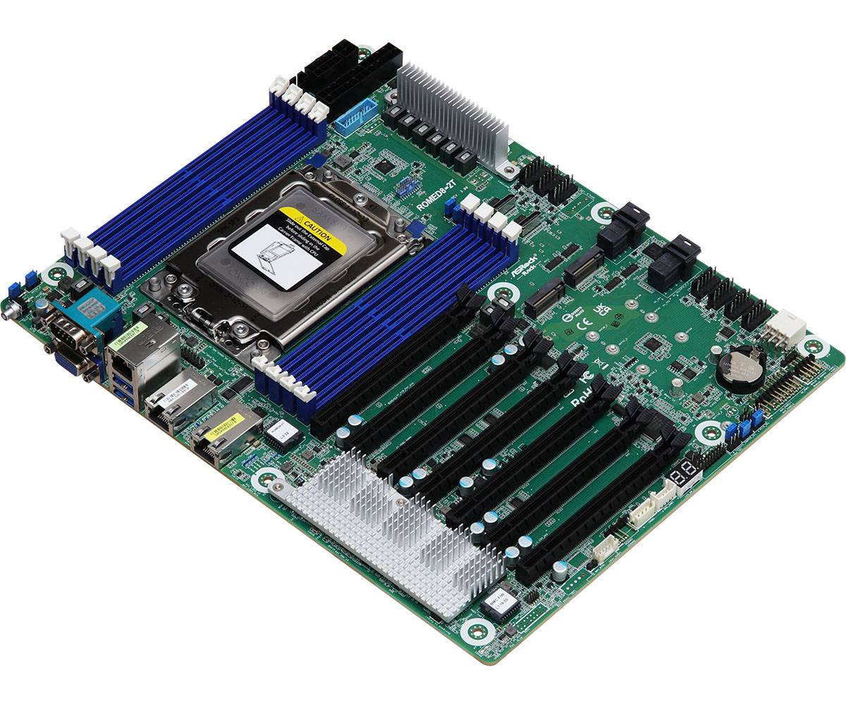 Computerhauptplatine mit zentraler Prozessorsockel, mehreren RAM-Steckplätzen, Erweiterungssteckplätzen, Kühlkörpern und hinteren Ein-/Ausgangsanschlüssen auf einer grünen Leiterplatte.