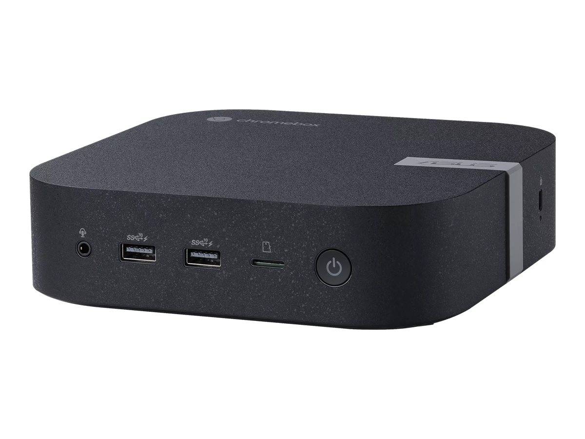 Schwarzer kompakter Mini-PC mit Kopfhörerbuchse an der Vorderseite, zwei USB-Anschlüssen, SD-Kartensteckplatz und Einschaltknopf auf einfachem Hintergrund