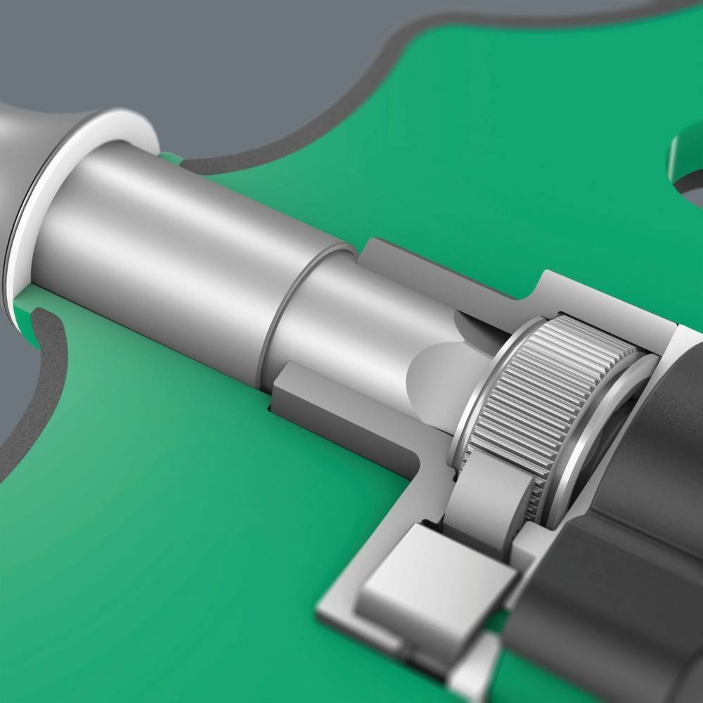 Nahaufnahme eines Metallspritzgussmaschinenbauteils mit einer rotierenden Komponente, die industrielle Details und Maschinenmechanik hervorhebt.