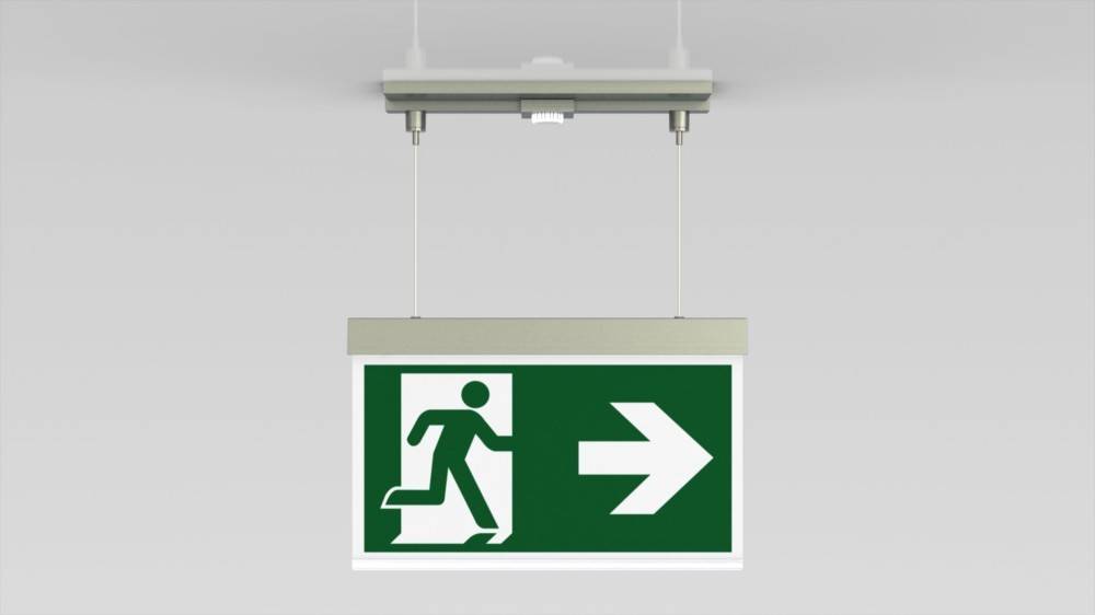 Notausgangsschild mit einer Figur, die durch eine Tür läuft und ein Pfeil, der nach rechts zeigt, der die Richtung zur Evakuierung angibt.