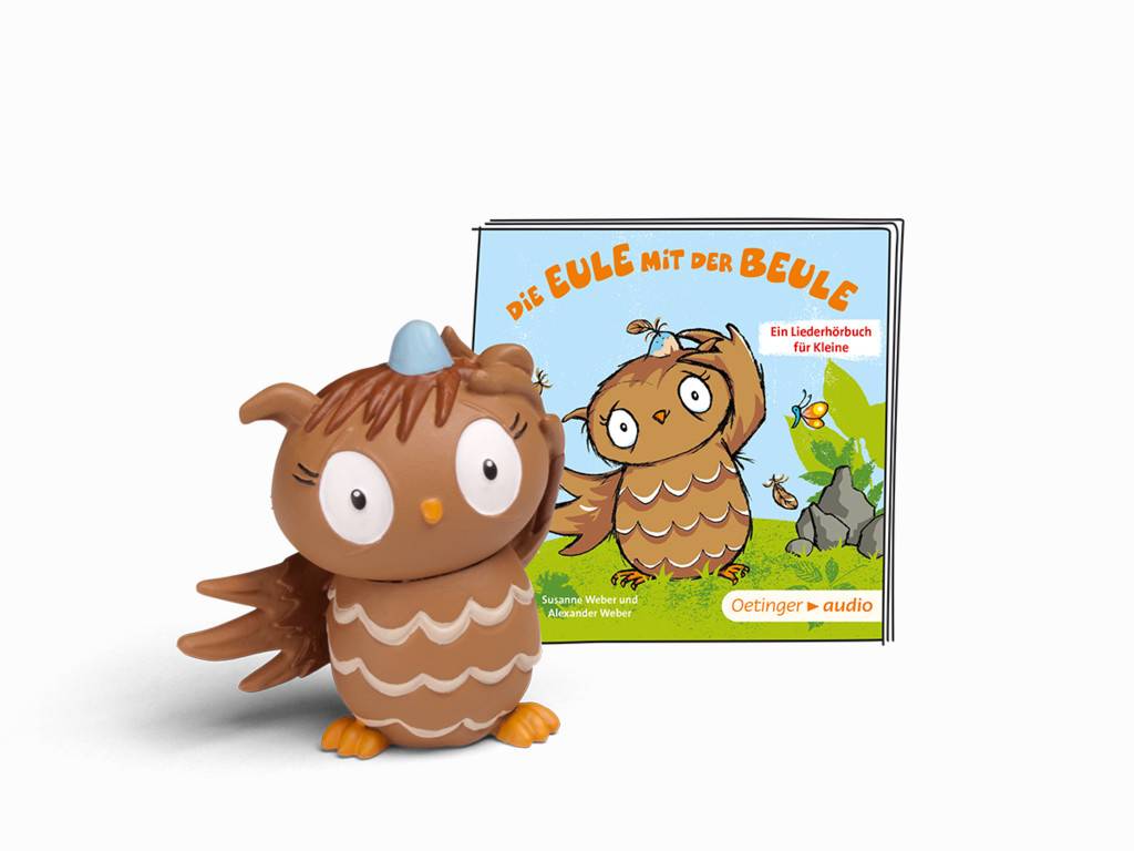 Cartoon-Eulenfigur vor einem Kinderbuch mit dem Titel „Die Eule mit der Beule