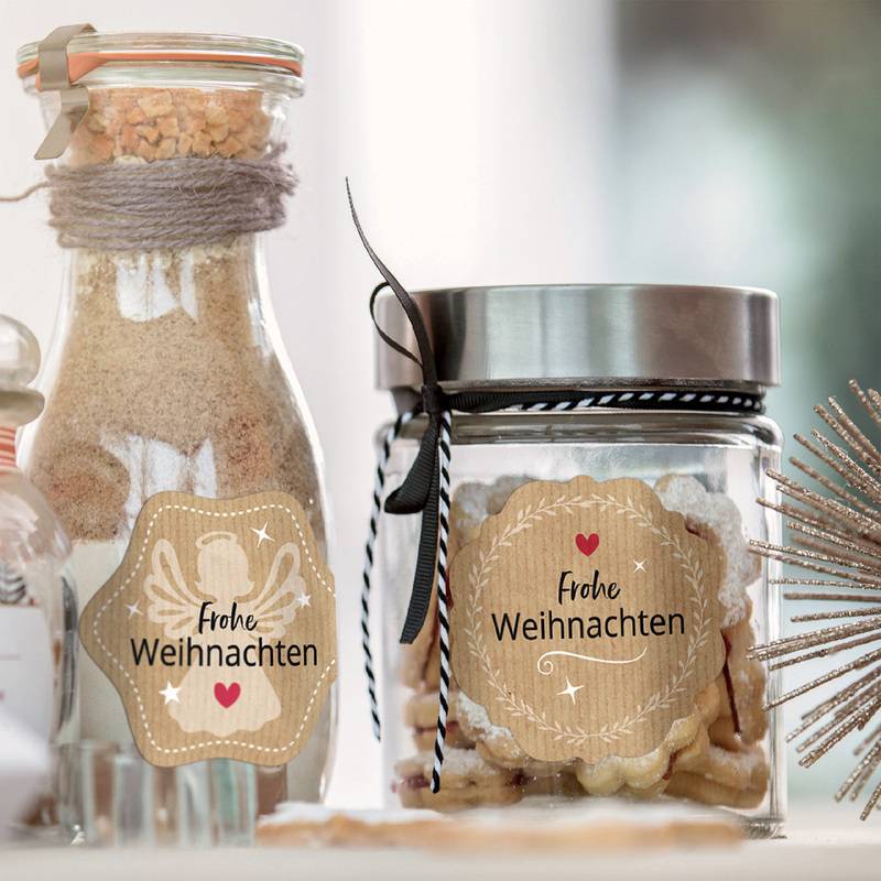 Zwei mit der Aufschrift „Frohe Weihnachten