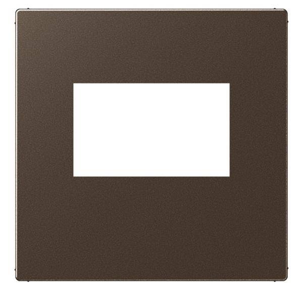 Ein quadratischer, dunkel gefärbter Zierrahmen mit einem zentralen rechteckigen Ausschnitt, wahrscheinlich zum Aufhängen gedacht.