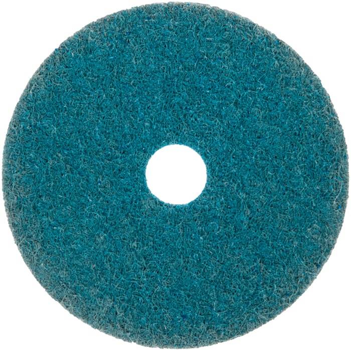 Ein blauer Schleifpad in kreisförmiger Gestalt mit einem zentralen Loch, der zum Reinigen oder Polieren von Oberflächen verwendet wird.