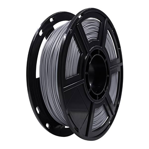 Schwarze Spule aus grauem 3D-Drucker-Filament auf weißem Hintergrund.