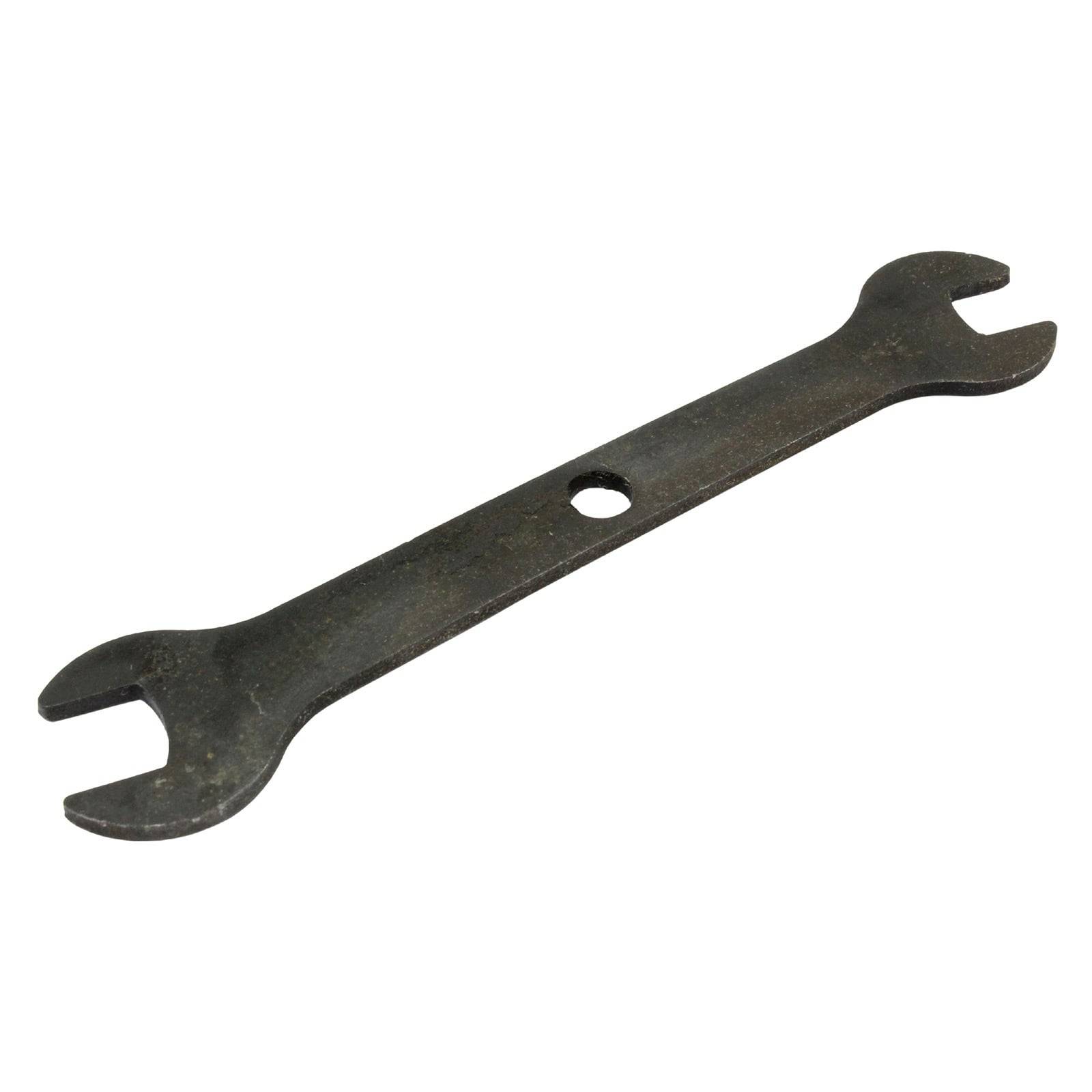 Ein flacher, metallener Doppelgabelschlüssel mit einem Ende, das etwas größer ist als das andere, mit einem Loch in der Mitte.
