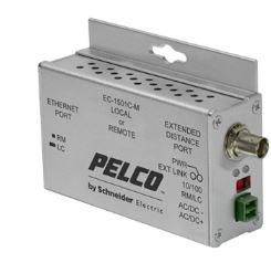 Grauer Pelco von Schneider Electric Ethernet-Verlängerungsmodul mit Frontbeschriftungen für Local/Remote- und Fernstreckenports sowie Steckverbinder an der Seite.