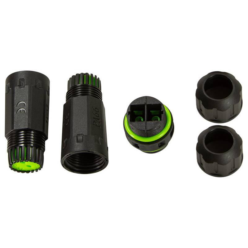 Schwarzer und grüner wasserdichter elektrischer Verbindungssatz mit zwei männlichen und zwei weiblichen Teilen, der zerlegt dargestellt wird, um die Innenkomponenten zu zeigen.