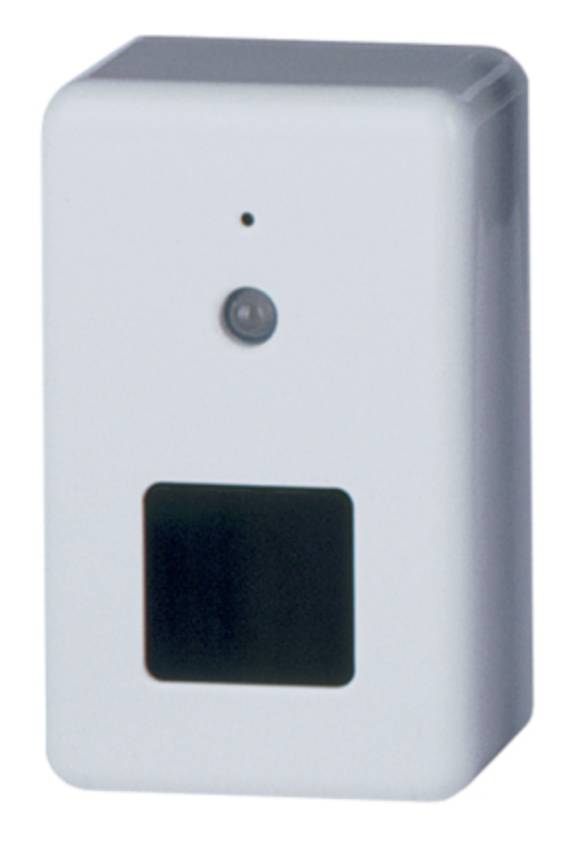 Ein weißer wandmontierter Sensor oder Spender mit einem kleinen Indikatorpunkt, einer kreisförmigen Linse und einer quadratischen dunklen Öffnung in der Nähe des unteren Bereichs.