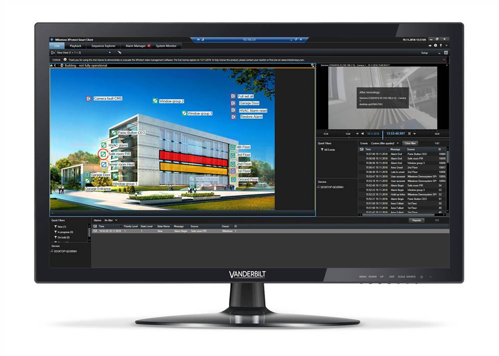 Ein Desktop-Monitor zeigt eine Gebäudedesign-Anwendung mit einer 3D-Gebäudedarstellung, Messbeschriftungen und einem Projektfenster mit Dateilisten auf der rechten Seite an.