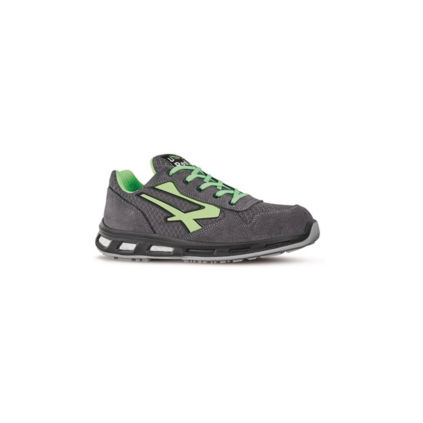 Ein einzelner grauer Sneaker mit grünen Akzenten und Schnürsenkeln, der ein futuristisches Design und sichtbare Luftpolsterung in der Sohle aufweist.