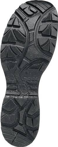 Eine schwarze Schuhsohle mit sichtbaren Profilmustern, die für Traktion und Haltbarkeit konzipiert ist. Die Muster weisen tiefe Rillen und kreisförmige Strukturen auf.