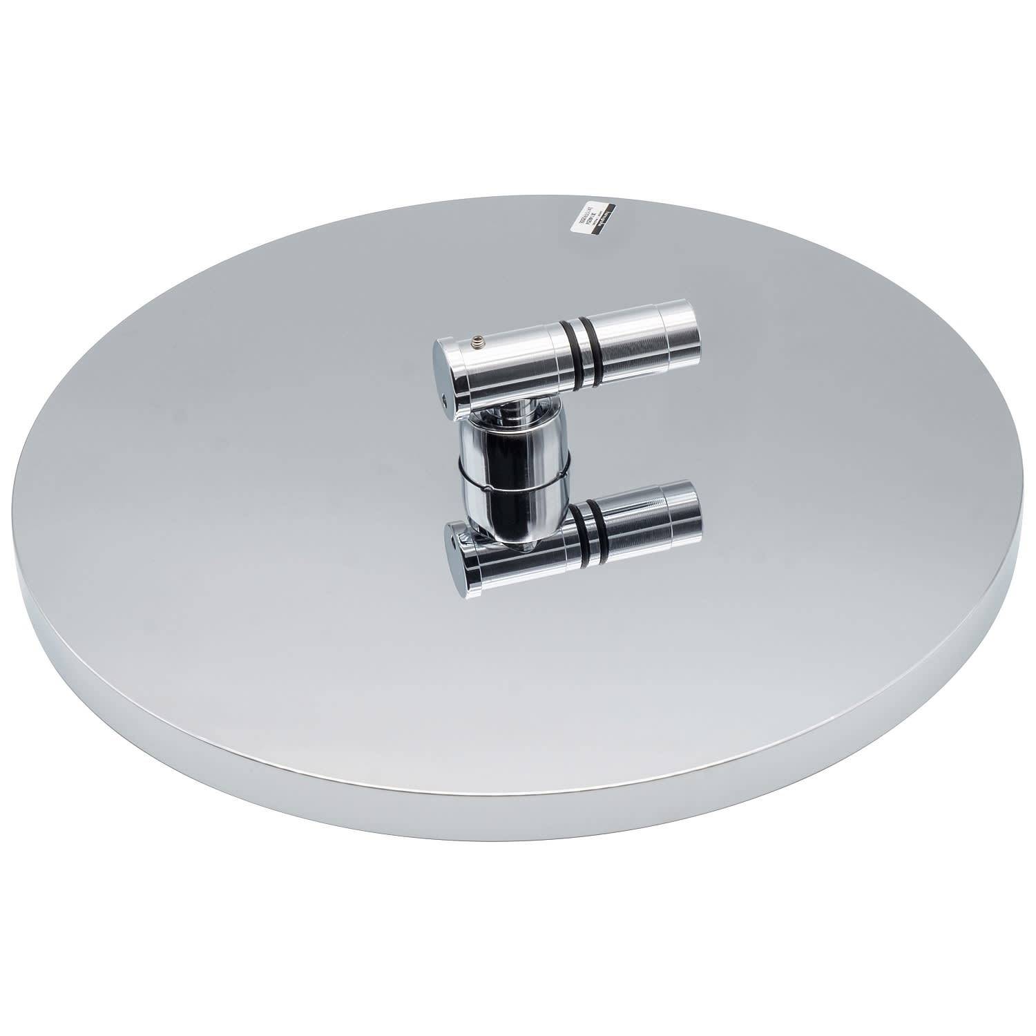 Eine silberne metallische Rundplatte mit einem kleinen verchromten zylindrischen Stecker in der Mitte, gezeigt auf einem einfachen weißen Hintergrund.