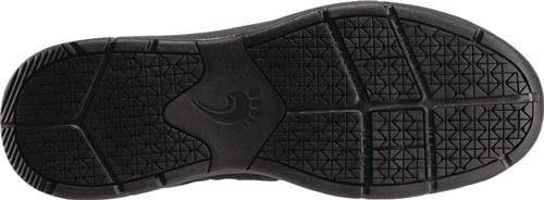 Nahaufnahme einer Schuhsohle mit strukturiertem Profilmuster, die geometrische Formen und ein zentrales Logodesign aufweist.