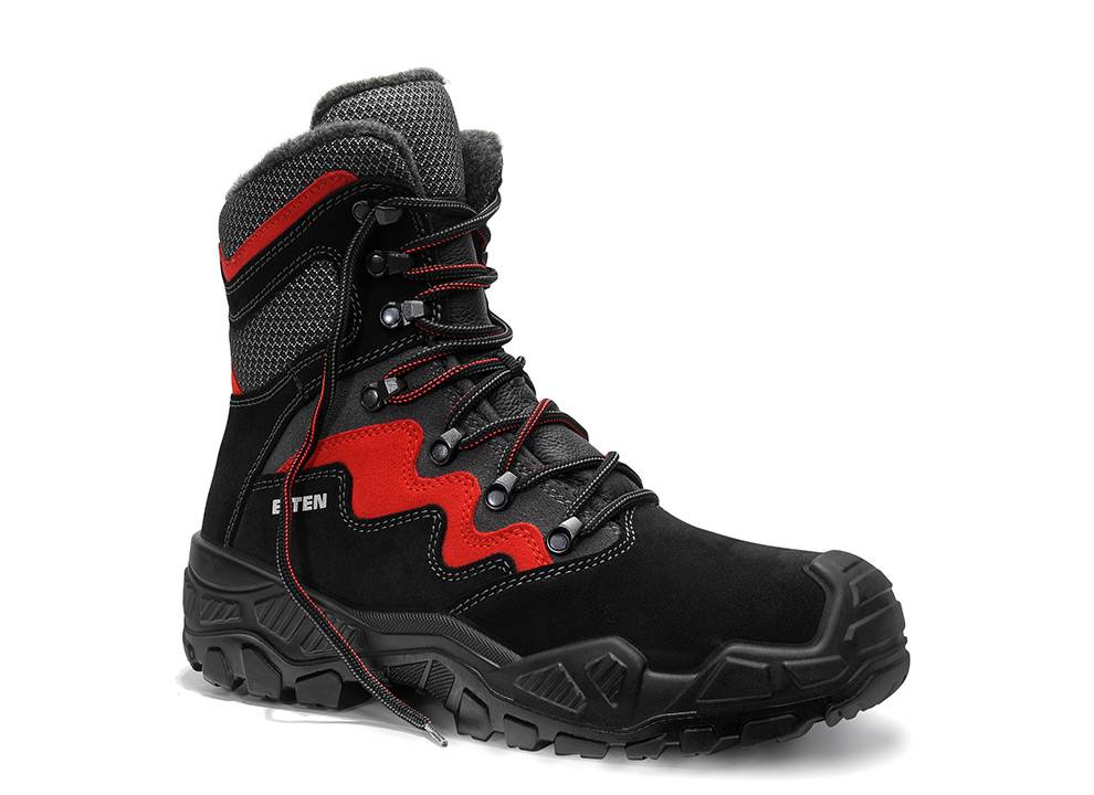 Ein schwarzer und roter Wanderschuh mit einer robusten Sohle, roter Einfassung, schwarzen Schnürsenkeln und einem grauen Netzschaftrand, der für den Outdoor-Einsatz entwickelt wurde.