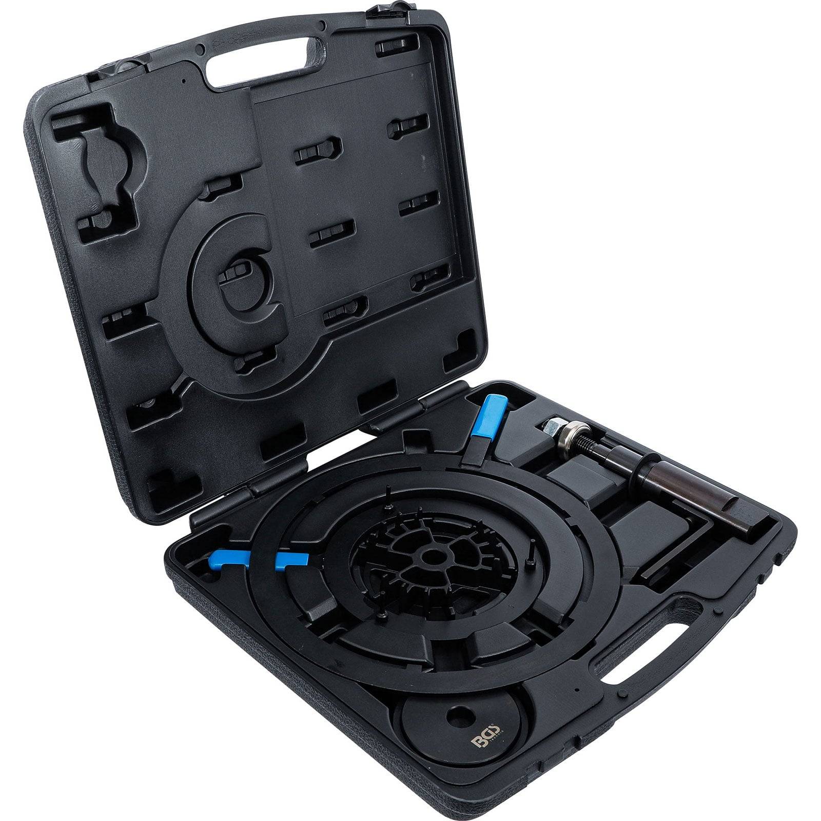 Gehäuse, das einen kreisförmigen Werkzeugkoffer mit verschiedenen geformten Komponenten enthält, die im Inneren sicher befestigt sind.