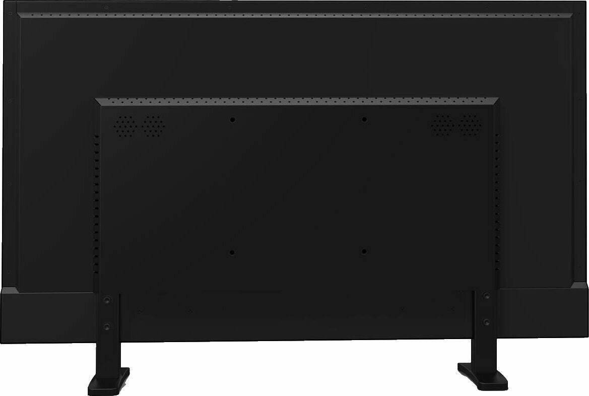 Ein schwarzer Metallschrank mit Lüftungslöchern und einer glatten, ebenen Oberfläche, der sich im Innenbereich befindet.