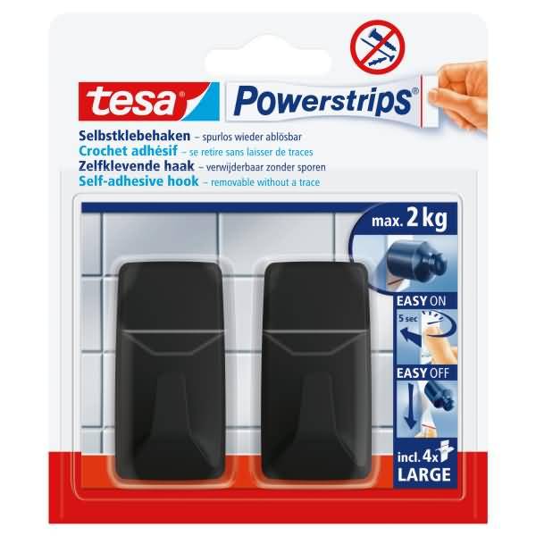 Packung tesa Powerstrips Selbstklebende Haken, zeigt zwei schwarze Haken auf Fliesen und Angaben: max. 2 kg, einfaches An-/Ausanbringen, hinterlässt keine Spuren.