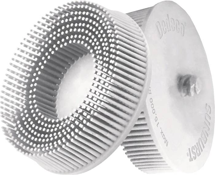 Ein rundes Metalltool mit feinen, gleichmäßig angeordneten Zähnen in einem kreisförmigen Muster. Das Werkzeug ist mit dem Text 'Devilco' und 'MAX. 1500 U/MIN' beschriftet.