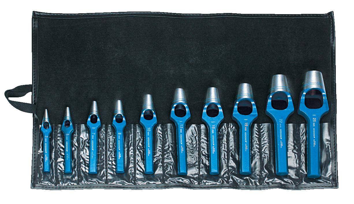 Satz aus sieben blauen Metall-Hohlstanzern in verschiedenen Größen, angeordnet in einem schwarzen Koffer, verwendet für Handwerk oder Lederarbeiten.