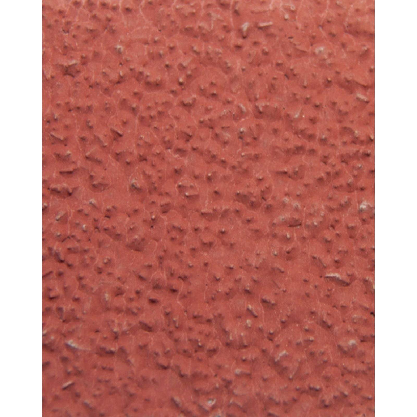 Ein Nahaufnahme-Bild einer roten, strukturierten Oberfläche, die Stuck oder rauem Putz ähnelt. Die Textur ist uneben mit kleinen Unebenheiten im gesamten Bereich.