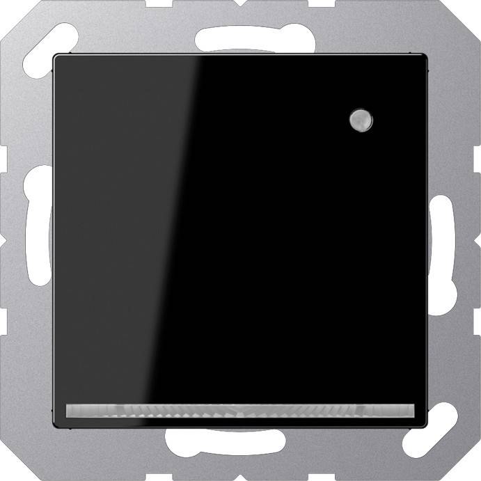 Ein schlanker schwarzer quadratischer Lichtschalter mit einem kleinen kreisrunden Knopf und einer horizontalen LED-Anzeige am unteren Rand, montiert auf einem Metallrahmen.