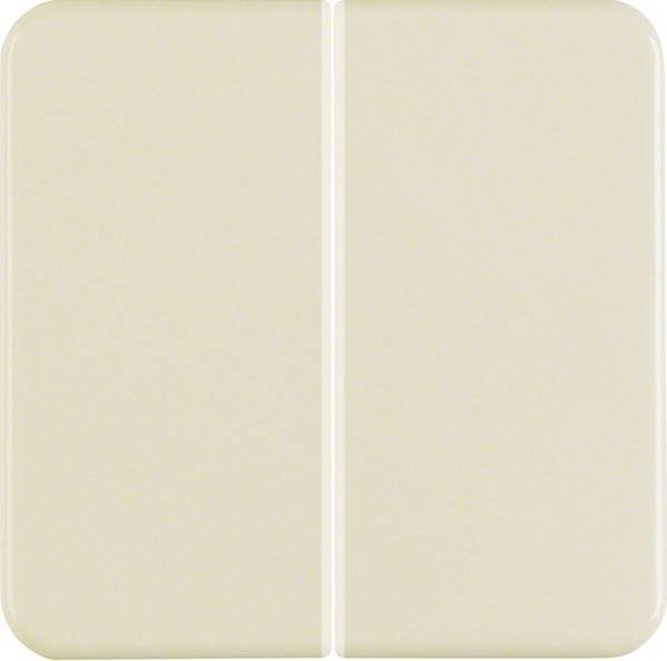 Eine beige Keramikwandkachel mit einer dezenten Naht, die sie in zwei gleiche Teile teilt, mit einer glänzenden Oberfläche.