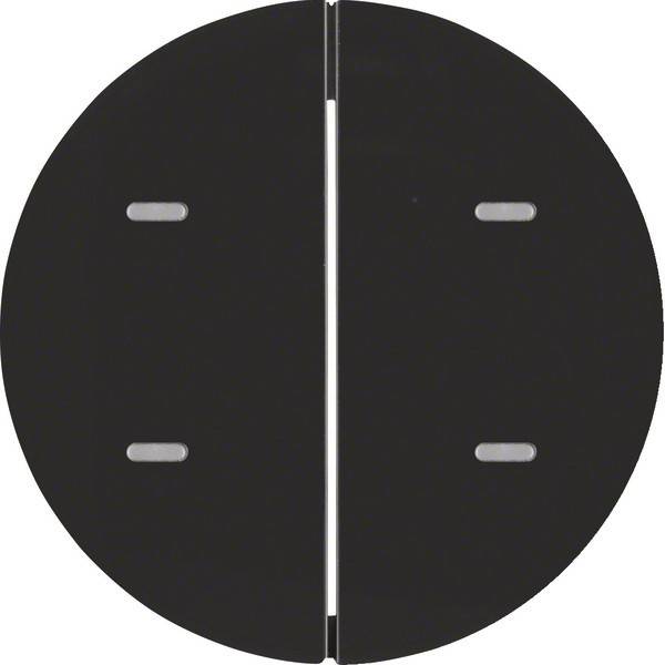 Ein schwarzes kreisförmiges Objekt, vertikal in zwei Hälften geteilt, mit vier kleinen Schlitzen, die gleichmäßig über jede Hälfte verteilt sind.