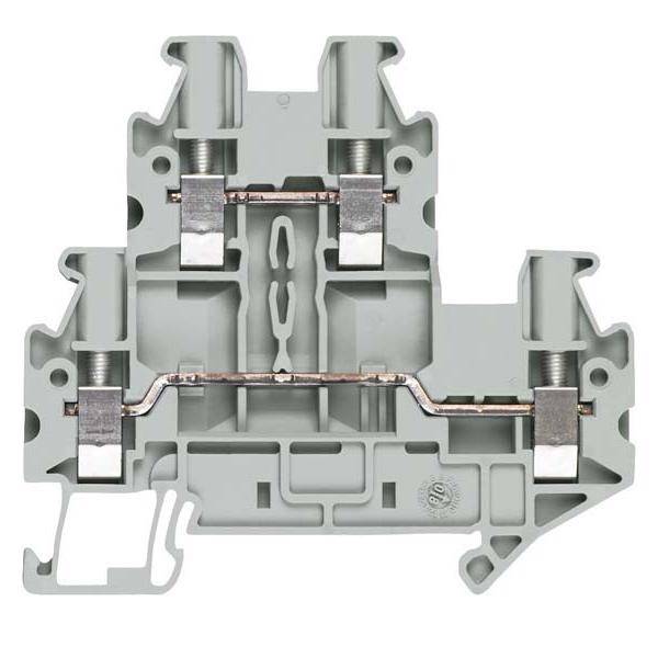 Ein grauer Elektroklemmenblock mit Metallschraubanschlüssen, der zum Befestigen von zwei Drähten in einem elektrischen Stromkreis verwendet wird.