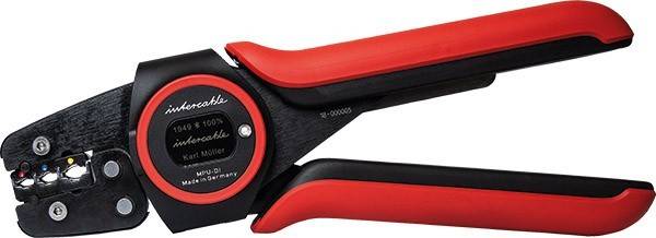 Nahaufnahme eines roten und schwarzen Werkzeugs, möglicherweise einer Drahtschere oder Zange, die das Drehgelenk und einen Teil der Griffe zeigt.