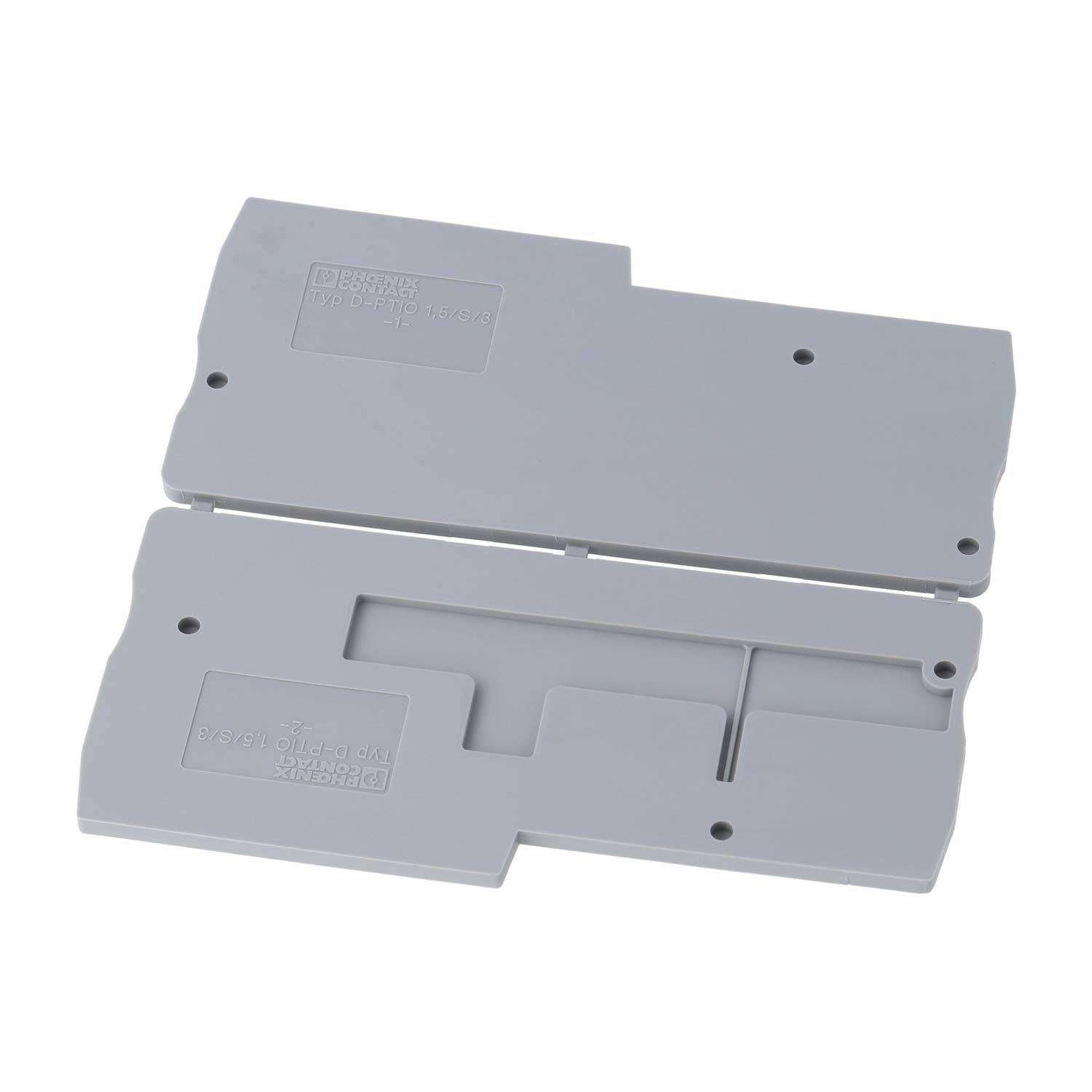 Eine graue Kunststoff-Schalterabdeckung mit geprägten Beschriftungen und Schlitzen.