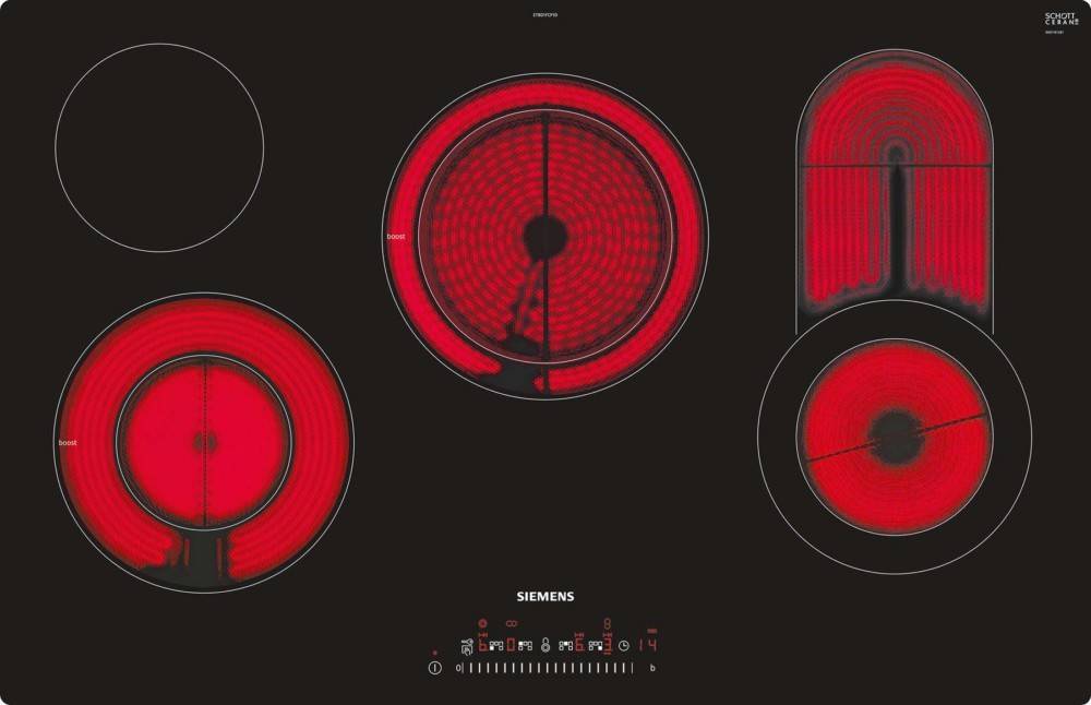Eine schwarze Siemens Elektro-Kochplatte mit vier leuchtend roten Heizelementen in unterschiedlichen Größen. Die Bedienelemente befinden sich in der Mitte unten.