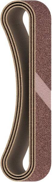 Nahaufnahme von vertikal geschichteten Materialien mit kontrastierenden Mustern und Farben: schwarze und beige Streifen neben glattem, glitzerndem Rosa.