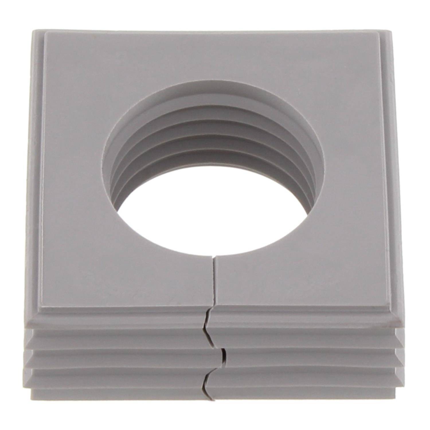 Ein quadratischer, grauer Gummiösen mit konzentrischen Rippen und einem zentralen kreisförmigen Loch.