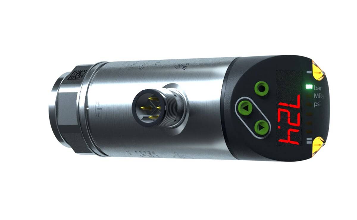 Ein zylindrischer Metalldrucksensor mit digitaler Anzeige und drei Kontrollknöpfen auf einem schwarzen Panel, verwendet für Messanwendungen.