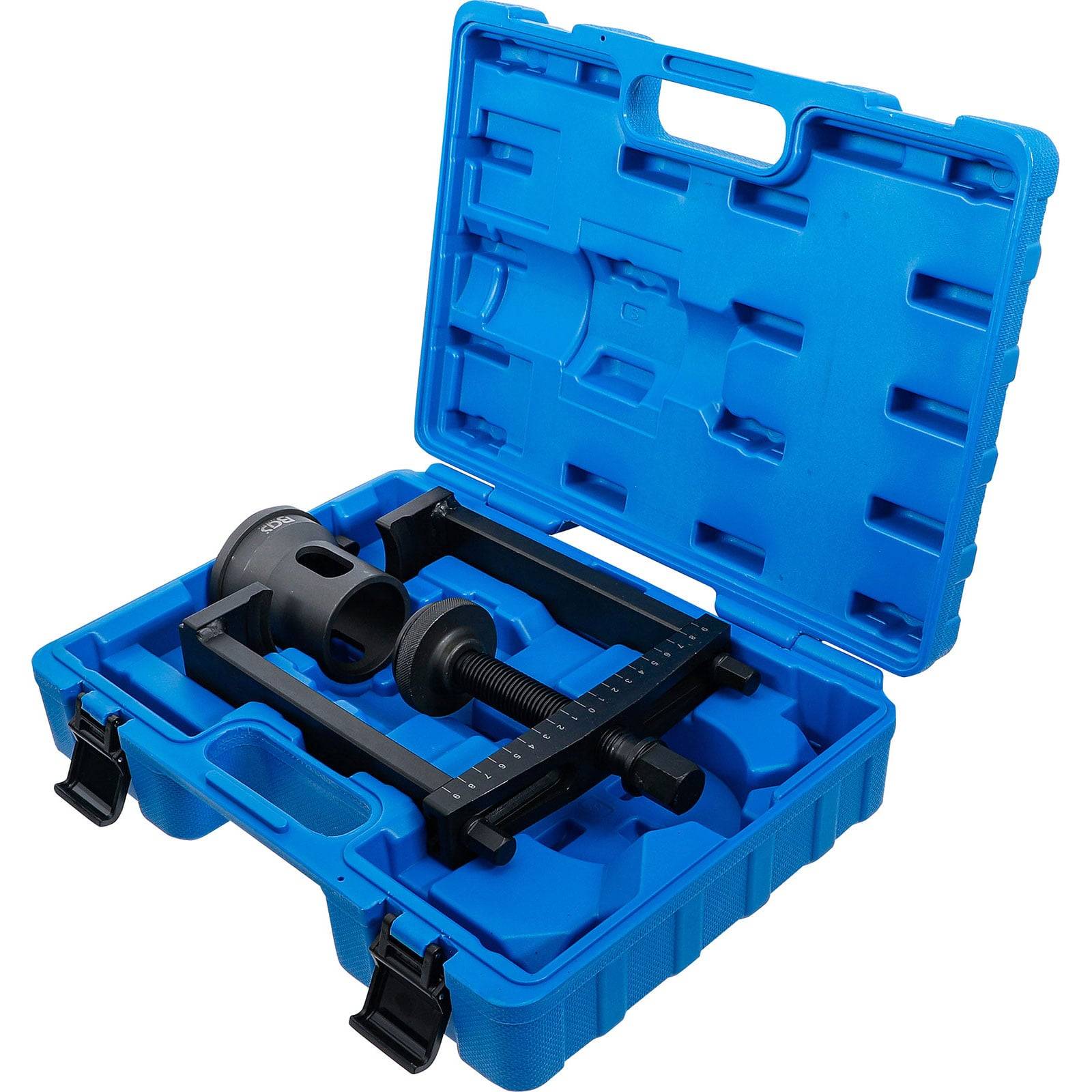 Eine blaue Plastikbox, die ein schwarzes mechanisches Werkzeug mit einem Schraubmechanismus enthält, das zum Ziehen oder Zusammendrücken von Komponenten verwendet wird.